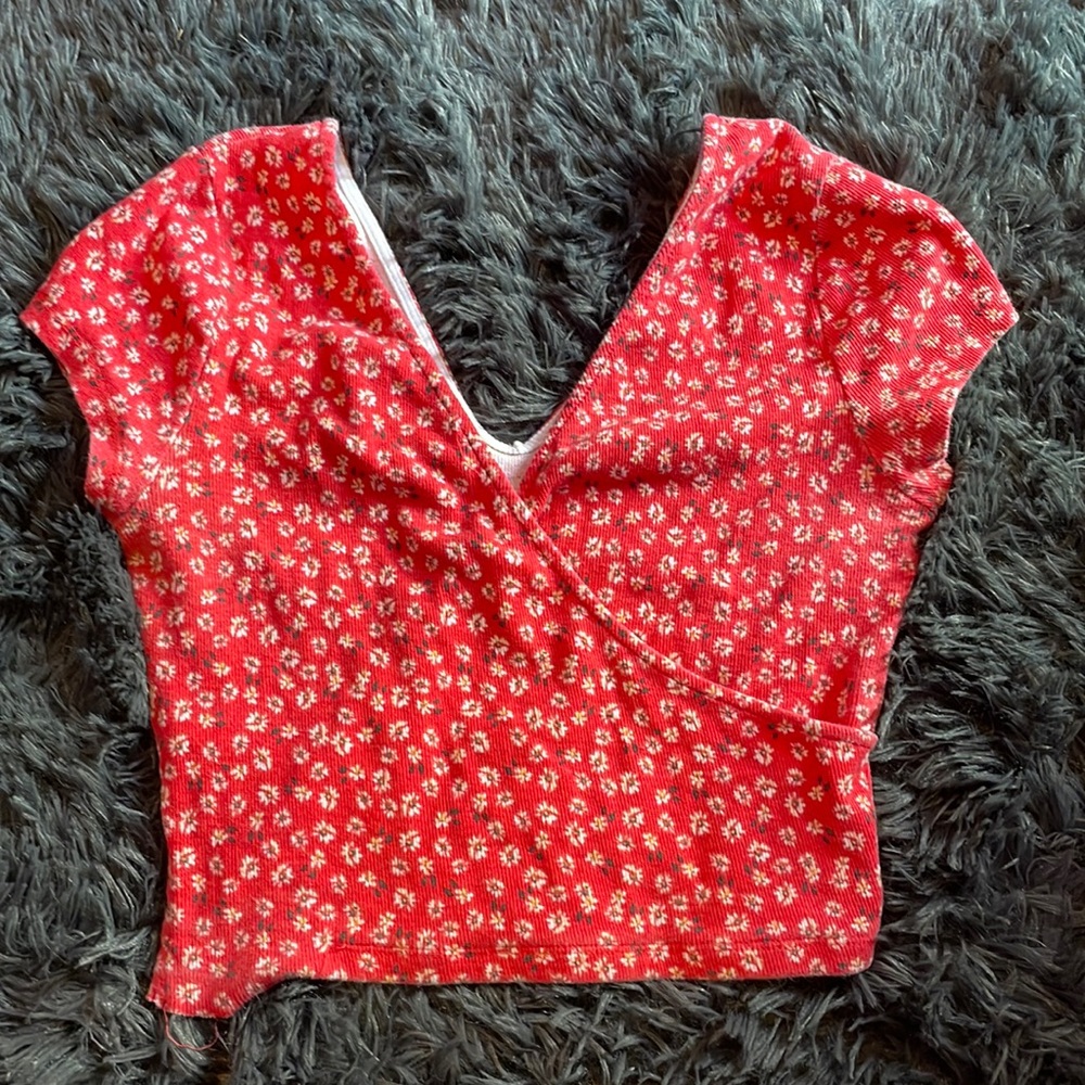 Red and white v-necked crop top cross over on the chest
